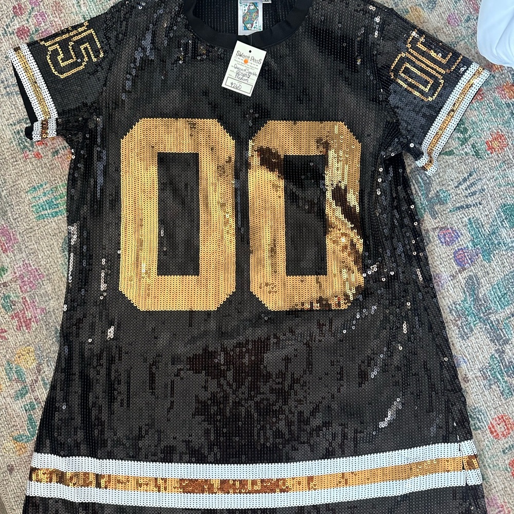 QUEEN OF SPARKLES Black and Gold Sequin Jersey